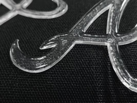 لوگو TPU نیمه شفاف درخشان و شبیه سازی شده برای لباس