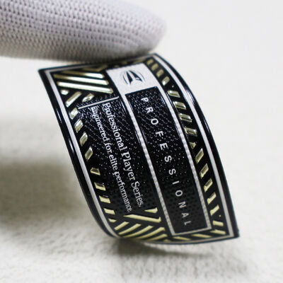 پیچ فرکانس بالا TPU سفارشی - نشان سری بازیکن حرفه ای طلایی و سیاه فلزی برای لباس های ورزشی